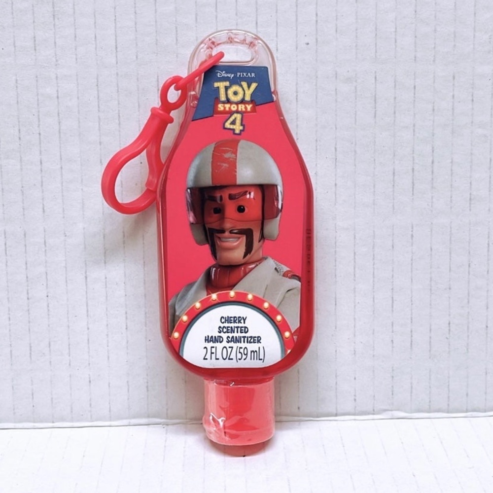 Disney pToy Story 4 Duke Caboom Cherry scented hand sanitizer with clip on.